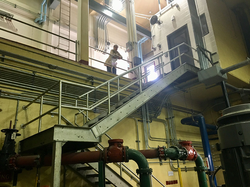WAC member Mary Adelstein views the engine room from above